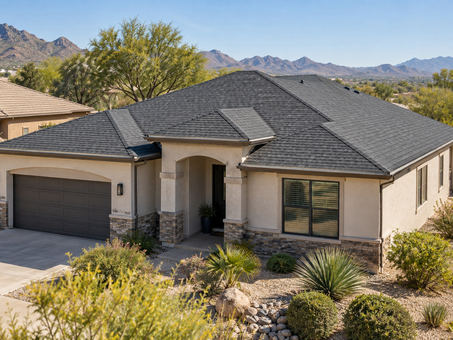 Illustrative Arizona home with a charcoal architectural shingle roof